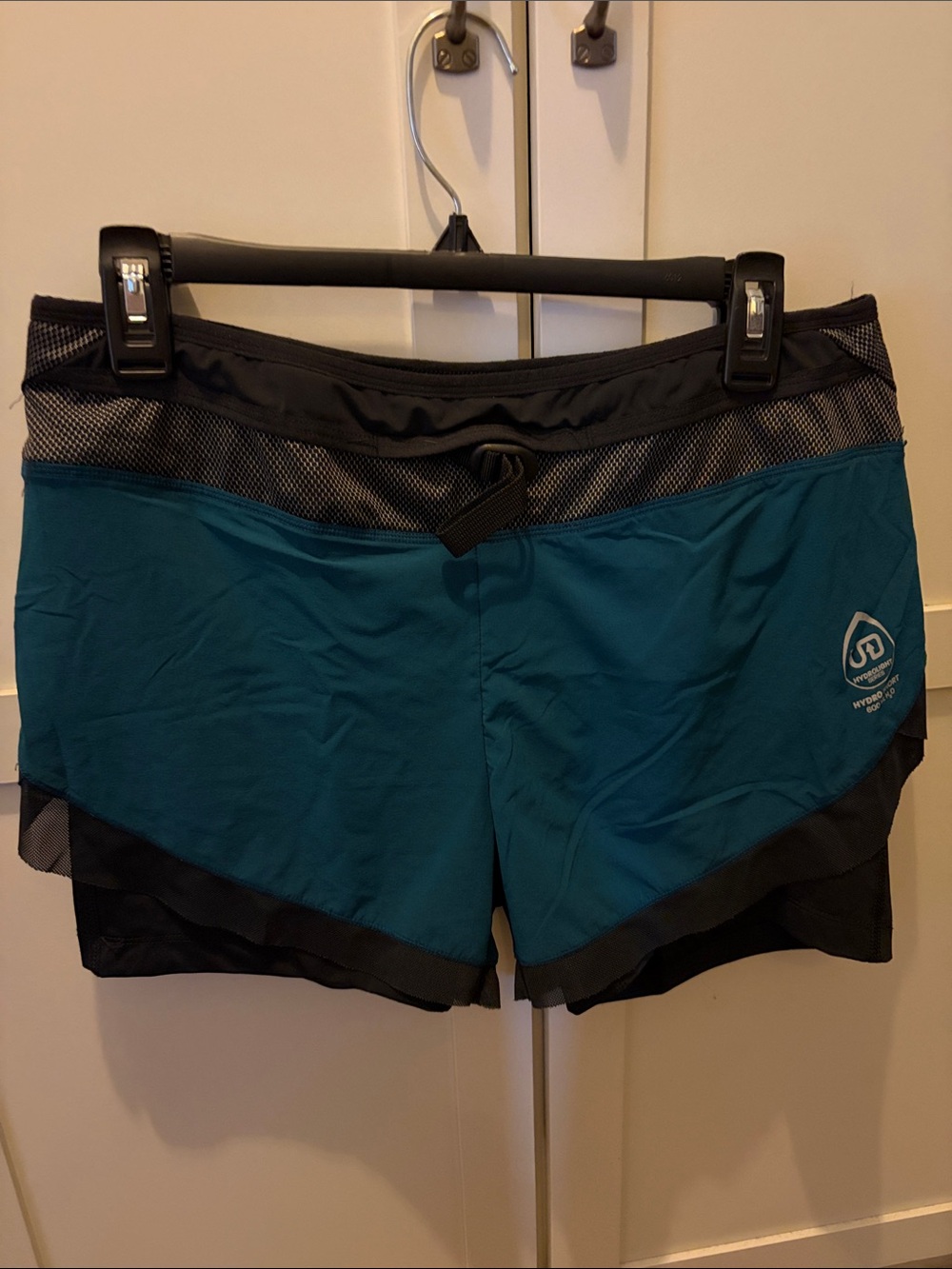 Ultimate Direction Women’s Teal Active Shorts with Black Trim